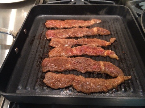 Korean boneless beef short ribs sizzling on the grill pan | Foodie Goes Healthy
