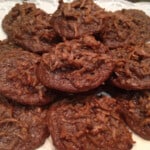 Chocolate macaroon cookies on a plate.