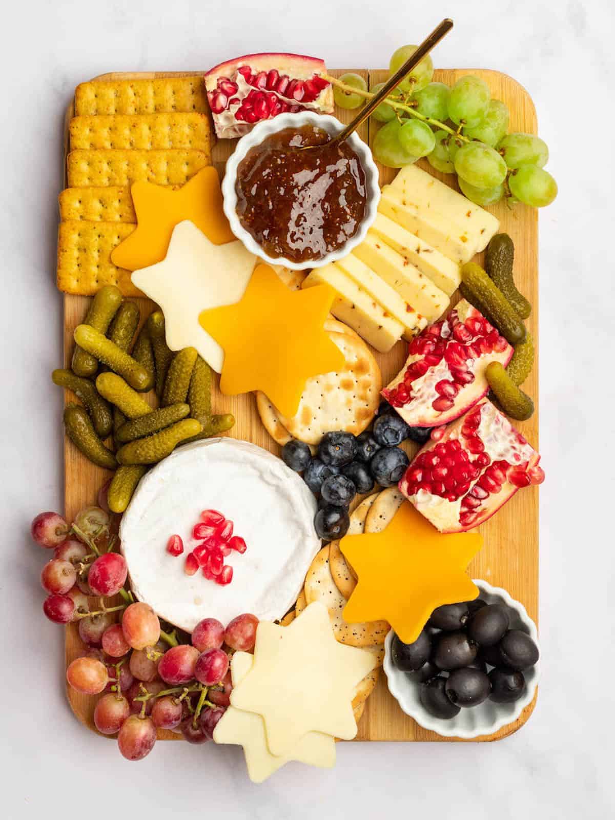 Star of David hanukah themed cheese board.