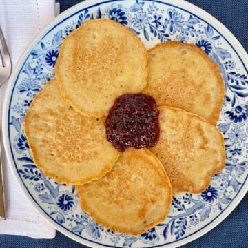 Matzo meal pancakes for passover on a plate with jam.