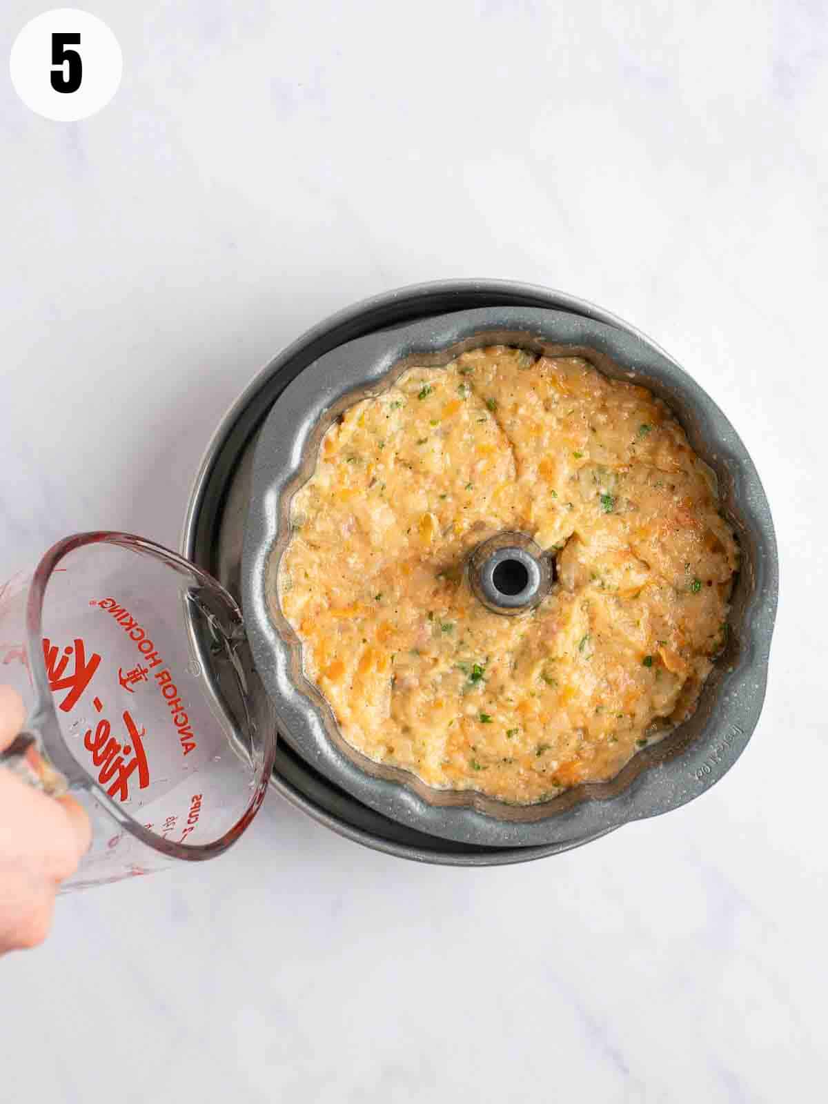 Preparing the water bath to bake the gefilte fish.