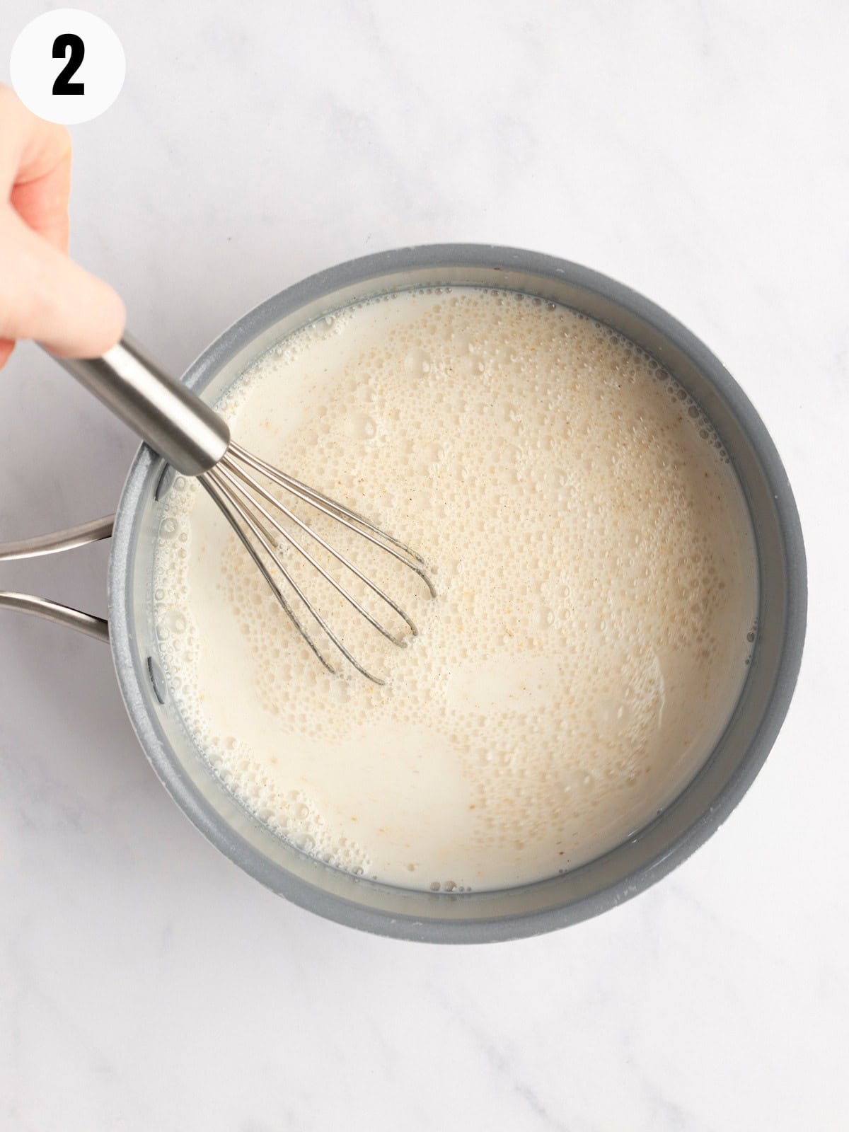 Cooking cornstarch and almond milk.