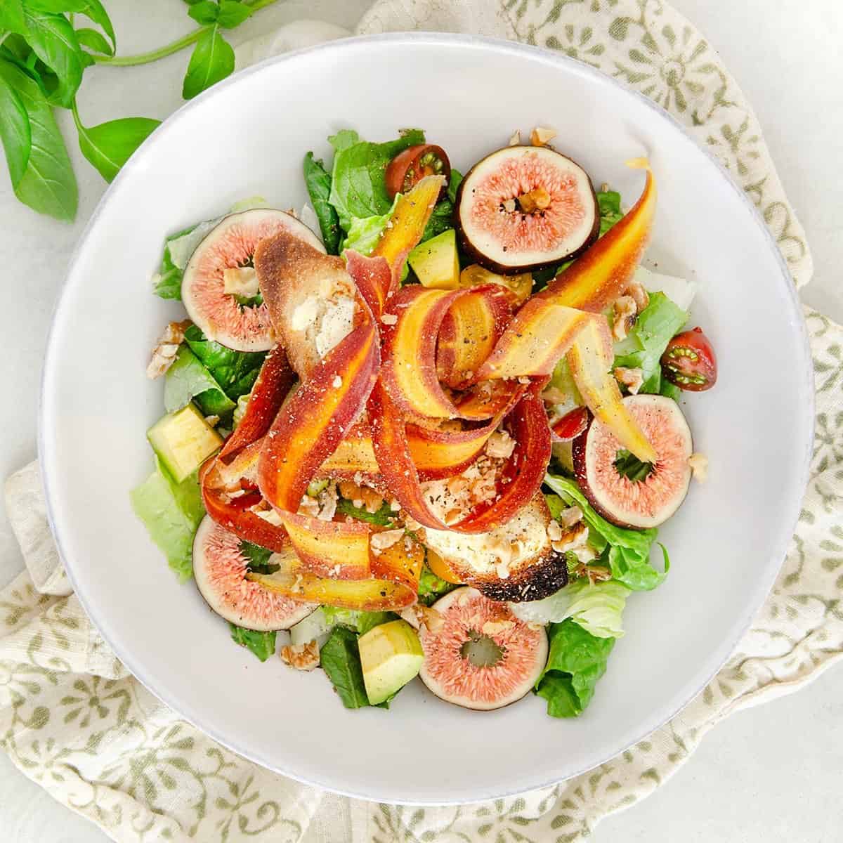 Summer salad with goat cheese crouton and figs.