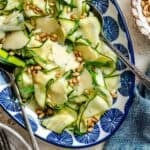 Zucchini ribbon salad with shaved Parmesan and pine nuts.