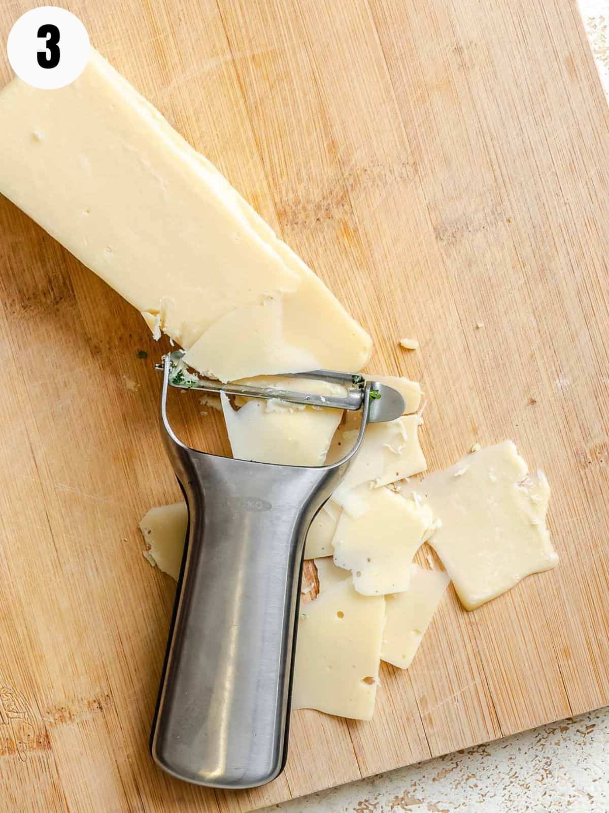 How to shave Parmesan with a vegetable peeler.