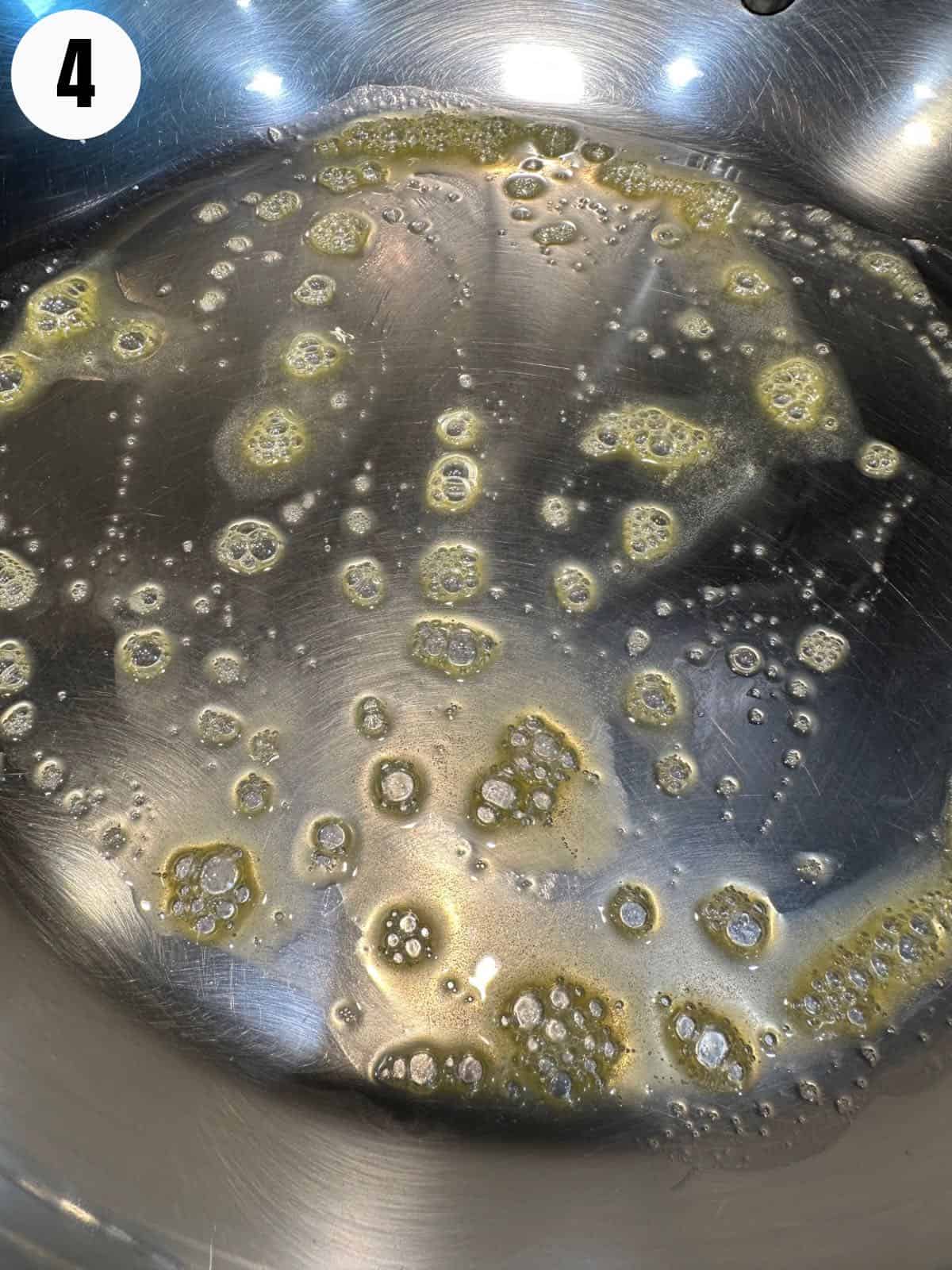Heat butter or oil in frying pan.